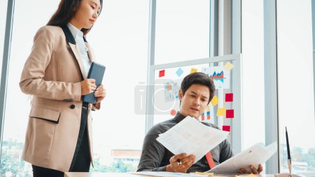 Photo for Unhappy business people dispute work problem at office . Business bankrupt failure and loss concept . Jivy - Royalty Free Image