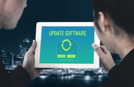 Photo for Software update on computer for modish version of device software upgrade - Royalty Free Image