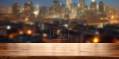 Photo for The empty wooden table top with blur background of cityscape. Exuberant image. - Royalty Free Image