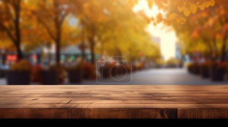 Photo for The empty wooden table top with blur background of outdoor cafe at the street. Exuberant image. - Royalty Free Image