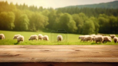 Foto de La mesa de madera vacía de color marrón con fondo borroso de pasto de ovejas. Imagen exuberante. - Imagen libre de derechos