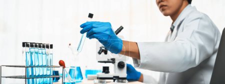 Photo for Scientist conduct chemical experiments and research in medical lab as groundbreaking developing for vaccine drug or antibiotic. Pharmaceutical and biochemistry laboratory. Neoteric - Royalty Free Image