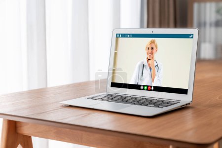Photo for Doctor video call online by modish telemedicine software application for virtual meeting with patient - Royalty Free Image