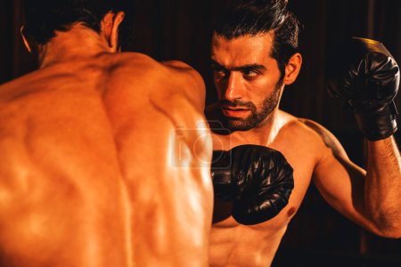 Photo for Asian and Caucasian Muay Thai boxer unleash their power in fierce boxing match. Two MuayThai boxer with strong muscular body exchanging punch and strike with relentless combat prowess. Impetus - Royalty Free Image