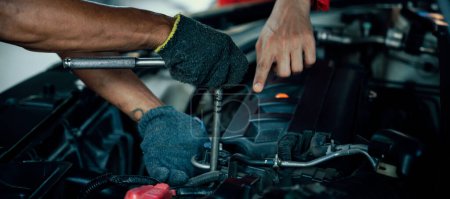 Photo for Panoramic banner automotive service mechanic inspect and diagnose car engine issue, repairing and fixing problem in workshop. Technician car care maintenance working on internal components. Oxus - Royalty Free Image