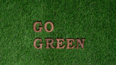 Photo for Go green and save the world with environment friendly effort. The message Go Green letters arranged to promote eco awareness for sustainable future with biophilc design background. Gyre - Royalty Free Image