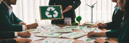 Photo for Group of business people planning and discussing on recycle reduce reuse policy symbol in office meeting room. Green business company with eco-friendly waste management regulation concept.Trailblazing - Royalty Free Image