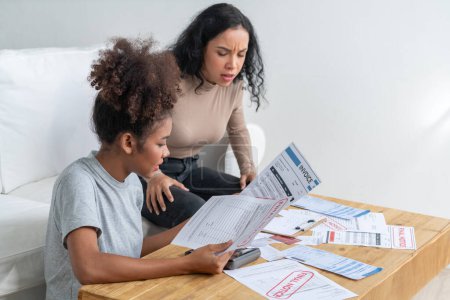 Photo for Stressed African American women has financial problems with credit card debt to pay crucial show concept of bad personal money and mortgage pay management crisis. - Royalty Free Image