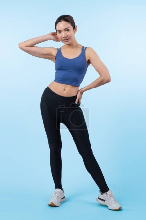 Photo for Full body asian woman in sportswear portrait, smiling and posing cheerful gesture. Workout training with attractive girl engage in her pursuit of healthy lifestyle. Isolated background Vigorous - Royalty Free Image