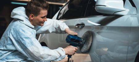 Photo for Automotive repair shop, concept of car detailing and polishing by professional car service worker with precision using orbital polisher machine creative captivating automotive flourish . Panorama Oxus - Royalty Free Image