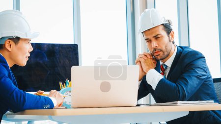 Photo for Engineer and architect meeting at office table about engineering and architecture project planning . Jivy - Royalty Free Image
