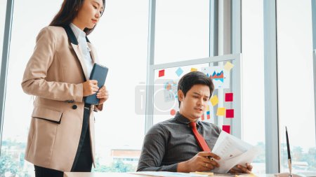 Photo for Unhappy business people dispute work problem at office . Business bankrupt failure and loss concept . Jivy - Royalty Free Image
