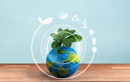 Photo for Eco world and green Earth day concept, Earth globe with young tree planted on top and eco-friendly design icon symbolize environmental protection and clean technology for sustainable future. Reliance - Royalty Free Image