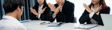 Photo for Candidate is rejected by job interviewer and human resources manager showing concept of unemployment, fired, disagreement and turning down the offer putting sadness on hiring person. Oratory failure. - Royalty Free Image