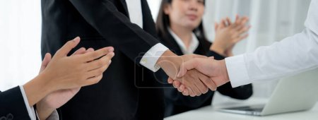 Photo for Business people group handshake at meeting table. Job interview success or making successful business oratory agreement - Royalty Free Image