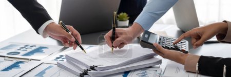 Photo for Auditor team collaborate in office, analyzing financial data and accounting record. Expertise in finance and taxation with accurate report and planning for company revenue, expense and budget. Insight - Royalty Free Image