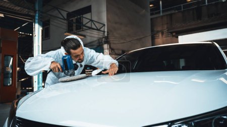Photo for Automotive repair shop, concept of car detailing and polishing by professional car service worker with precision using orbital polisher machine creative captivating automotive flourish . Panorama Oxus - Royalty Free Image