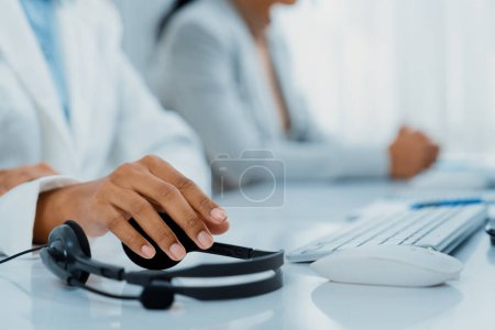 Photo for Close up shot of business people hand typing and working on desktop computer on the office desk. Business crucial communication and workplace concept. - Royalty Free Image