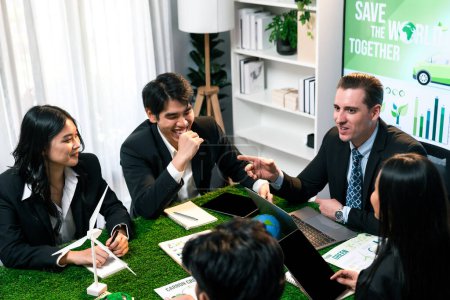 Photo for Diverse group of business people planning business marketing investment with eco-friendly policy for greener ecology. Productive teamwork contribute natural preservation and sustainable future. Quaint - Royalty Free Image