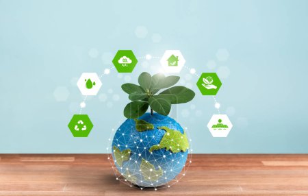 Photo for Eco world and green Earth day concept, Earth globe with young tree planted on top and eco-friendly design icon symbolize environmental protection and clean technology for sustainable future. Reliance - Royalty Free Image