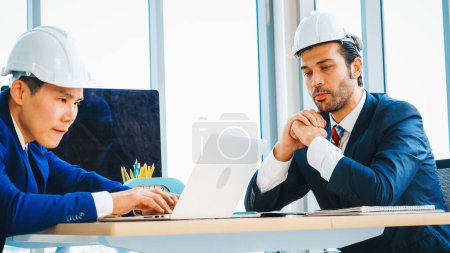 Photo for Engineer and architect meeting at office table about engineering and architecture project planning . Jivy - Royalty Free Image