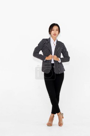 Photo for Asian woman full body portrait on white background wearing formal business suit . Jivy - Royalty Free Image