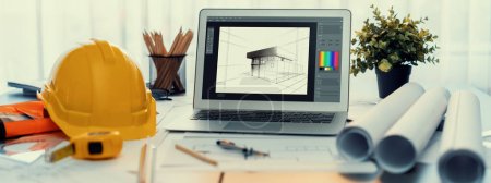 Photo for Digital blueprint by architecture design software on laptop screen with documents and blueprint layout on office table seamless integration of technology and traditional drafting method. Insight - Royalty Free Image