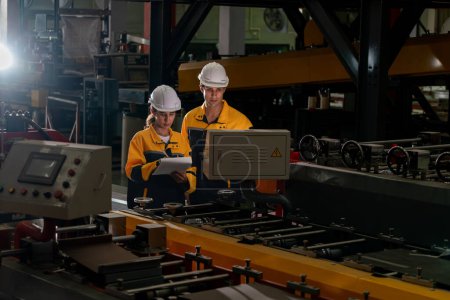 Photo for Professional quality control inspector conduct safety inspection on steel machinery and manufacturing process. Factory engineer or operator make optimization in heavy industry facility. Exemplifying - Royalty Free Image