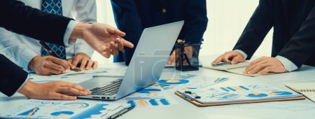 Photo for Business people in group meeting in formal attire share idea discussing report for company profit in creative workspace for start up business shot in close up view on group meeting table . Oratory . - Royalty Free Image