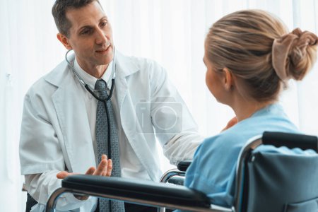 Photo for Doctor in professional uniform examining patient at hospital or medical clinic. Health care , medical and doctor staff service concept. Jivy - Royalty Free Image
