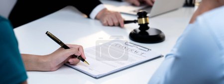 Photo for Couples file for divorcing and seek assistance from law firm to divide property after breakup. Obligations contract assist by lawyer in negotiating settlement agreement meeting. Panorama Rigid - Royalty Free Image