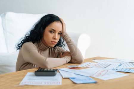 Photo for Stressed young woman has financial problems with credit card debt to pay crucial show concept of bad personal money and mortgage pay management crisis. sad and unhappy - Royalty Free Image