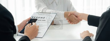 Corporate recruiter interview shake hand and hire job candidate after make successful job interview. Successful bob interview appointment for career opportunity and HR manager concept. Panorama Shrewd