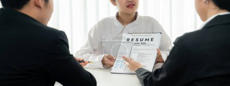 Photo for Corporate recruiter interview job applicant to discuss career goal and assess resume and experience. Job interview appointment for career opportunity and HR manager concept. Panorama Shrewd - Royalty Free Image