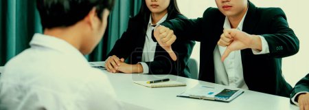 Photo for Candidate is rejected by job interviewer and human resources manager showing concept of unemployment, fired, disagreement and turning down the offer putting sadness on hiring person. Oratory failure. - Royalty Free Image