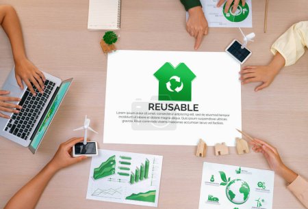 Photo for Reusable illustration placed at meeting table during a green business meeting discussion. ESG : environment social governance and Eco conservative concept. Top view. Delineation. - Royalty Free Image