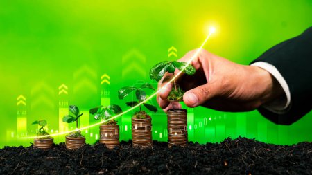 Photo for Growing coin or money stack with ESG businessman hand interacting symbolize eco investment with sustainable growth potential lead to profitable financial return and environmental protection. Reliance - Royalty Free Image