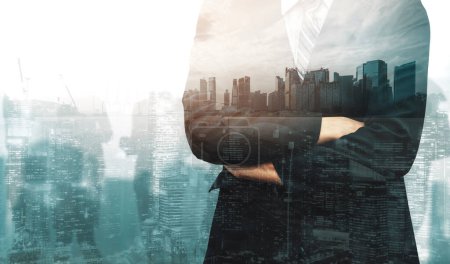 Photo for Double Exposure Image of Business Person on modern city background. Future business and communication technology concept. Surreal futuristic cityscape and abstract multiple exposure interface. uds - Royalty Free Image