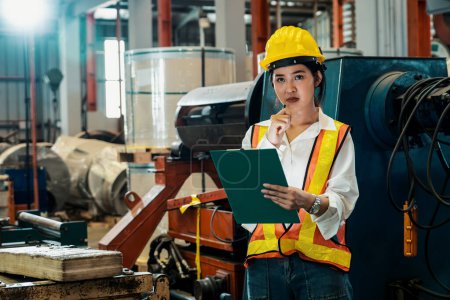 Photo for Professional quality control inspector conduct safety inspection on machinery and manufacturing process in factory. Female engineer overseeing process optimization in mechanical facility. Exemplifying - Royalty Free Image