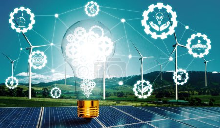 Foto de Bombilla de luz de innovación energética verde con futura industria de la interfaz gráfica de iconos de generación de energía. Concepto de desarrollo sostenible mediante energías alternativas. BARROS - Imagen libre de derechos