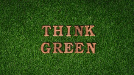 Foto de Alfabeto de madera dispuesto en ECO diseño de campaña de sensibilización sobre el fondo de hierba verde biofilia para promover la protección del medio ambiente para un futuro más verde y sostenible. Gyre. - Imagen libre de derechos