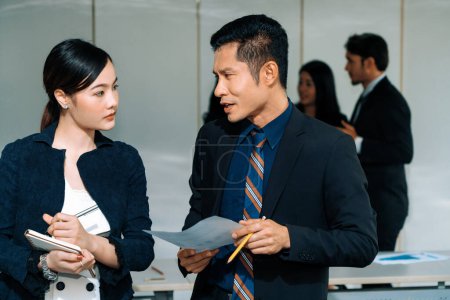 Photo for Businessman CEO talking to businesswoman secretary in the meeting room at international conference. Business concept. uds - Royalty Free Image
