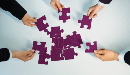 Photo for Top view panorama banner of business team assembling jigsaw puzzle over table symbolize business partnership and collective teamwork for HR recruitment and job seeker background. Shrewd - Royalty Free Image