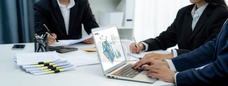 Photo for Business intelligence analyst team use BI software on laptop to analyze financial data dashboard. Business technology empower corporate executive to make strategic decision in panorama. Shrewd - Royalty Free Image