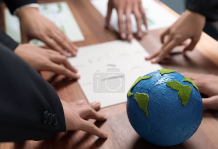 Photo for Cohesive group of business people forming jigsaw puzzle pieces in environmental awareness symbol as eco corporate responsibility for community and sustainable solution for greener Earth. Quaint - Royalty Free Image
