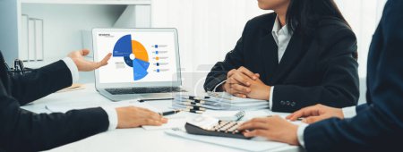 Photo for Business intelligence analyst team use BI software on laptop to analyze financial data dashboard. Business technology empower corporate executive to make strategic decision in panorama. Shrewd - Royalty Free Image