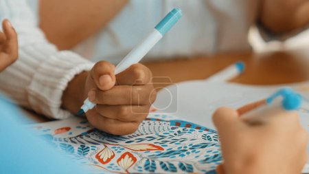 Photo for Panorama shot of diverse student hand drawing and coloring by using marker at drawing book. Closeup of multicultural learner hands using drawing book together at art lesson. Relaxation. Erudition. - Royalty Free Image