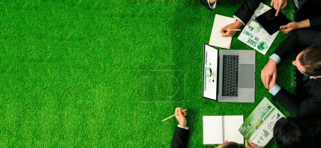 Photo for Panorama top view of business people planning business marketing with environmental responsibility for greener ecology. Productive teamwork contribute nature preservation sustainable future. Quaint - Royalty Free Image