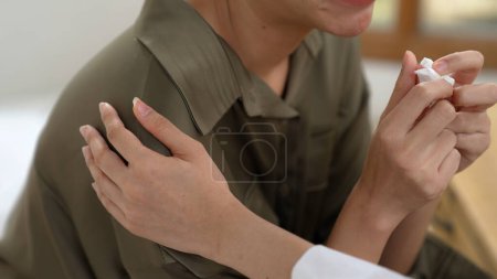 Photo for Supportive and comforting hands cheering up depressed patient person or stressed mind with empathy. Psychologist reassuring stressful and sad patient in vivancy clinic. - Royalty Free Image