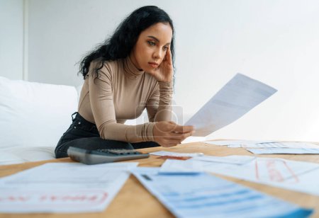 Photo for Stressed young woman has financial problems with credit card debt to pay crucial show concept of bad personal money and mortgage pay management crisis. - Royalty Free Image